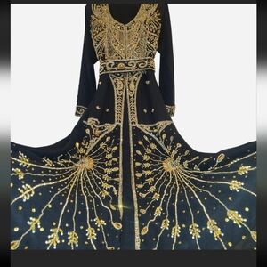 Elegant Black and Gold Heavily Embellished Dress